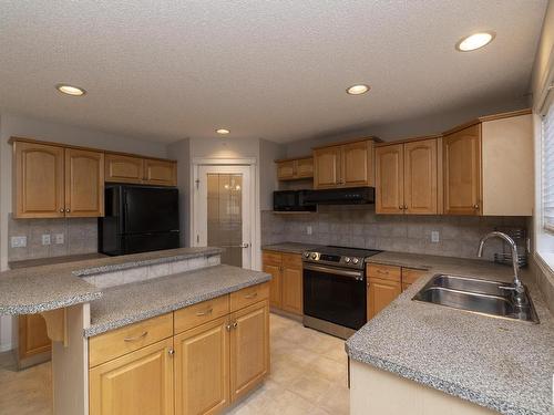 1026 Rutherford Place, Edmonton, AB - Indoor Photo Showing Kitchen With Double Sink