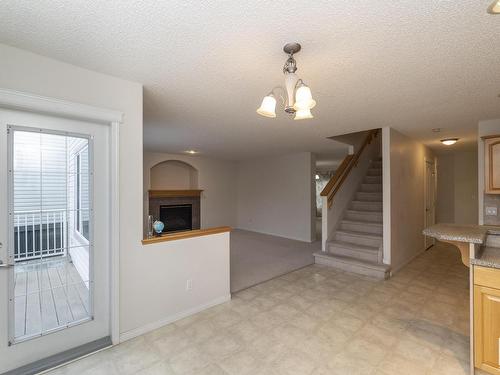 1026 Rutherford Place, Edmonton, AB - Indoor Photo Showing Other Room With Fireplace