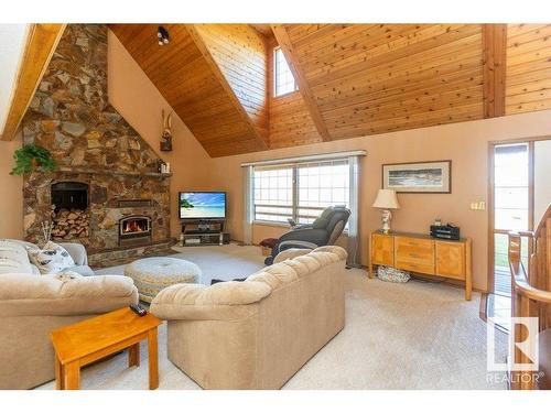 8 Sunrise Dr Summer Village Of Larkspur, Rural Westlock County, AB - Indoor Photo Showing Living Room With Fireplace