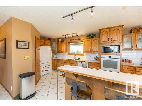 8 Sunrise Dr Summer Village Of Larkspur, Rural Westlock County, AB - Indoor Photo Showing Kitchen With Double Sink