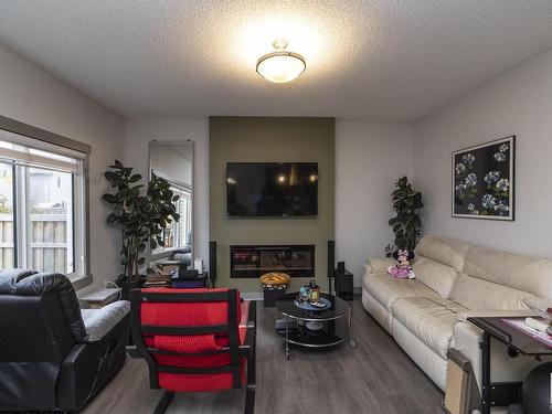 9755 224 Street, Edmonton, AB - Indoor Photo Showing Living Room With Fireplace