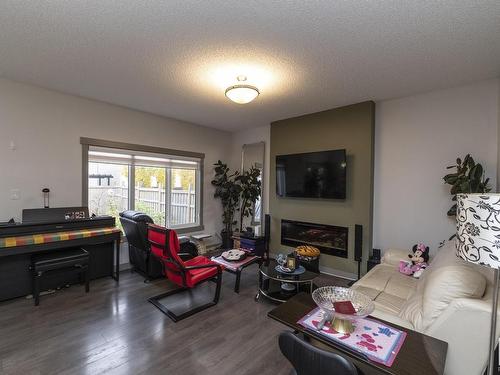 9755 224 Street, Edmonton, AB - Indoor Photo Showing Living Room With Fireplace