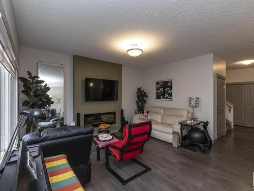 9755 224 Street, Edmonton, AB - Indoor Photo Showing Living Room With Fireplace