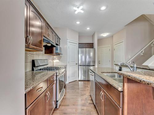 2815 17 Avenue Nw, Edmonton, AB - Indoor Photo Showing Kitchen With Double Sink With Upgraded Kitchen