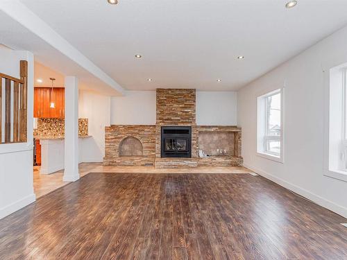 5911 110 Street, Edmonton, AB - Indoor Photo Showing Living Room With Fireplace