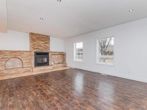 5911 110 Street, Edmonton, AB - Indoor Photo Showing Living Room With Fireplace