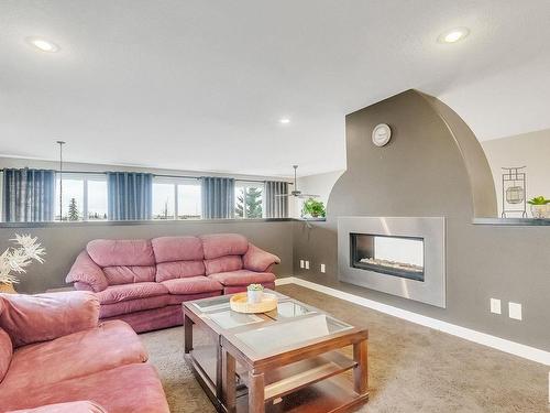 1722 Adamson Crescent, Edmonton, AB - Indoor Photo Showing Living Room With Fireplace