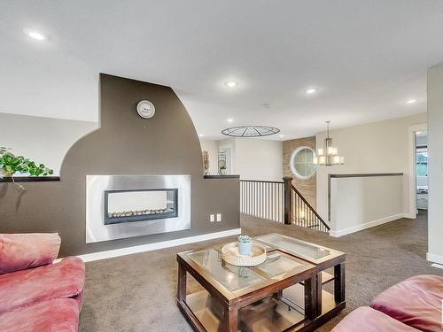 1722 Adamson Crescent, Edmonton, AB - Indoor Photo Showing Living Room With Fireplace