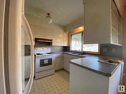 4005 53A Street, Wetaskiwin, AB - Indoor Photo Showing Kitchen With Double Sink