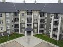 211 616 Mcallister Loop, Edmonton, AB  - Outdoor With Balcony With Facade 