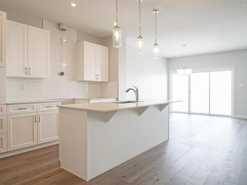 22 Enns Court, Fort Saskatchewan, AB - Indoor Photo Showing Kitchen With Upgraded Kitchen