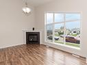 10313 157 Street, Edmonton, AB  - Indoor Photo Showing Living Room With Fireplace 