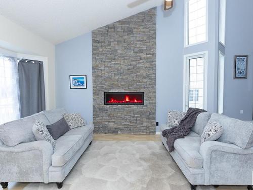 10627 108 Street, Westlock, AB - Indoor Photo Showing Living Room With Fireplace