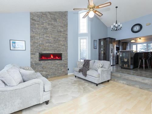 10627 108 Street, Westlock, AB - Indoor Photo Showing Living Room With Fireplace