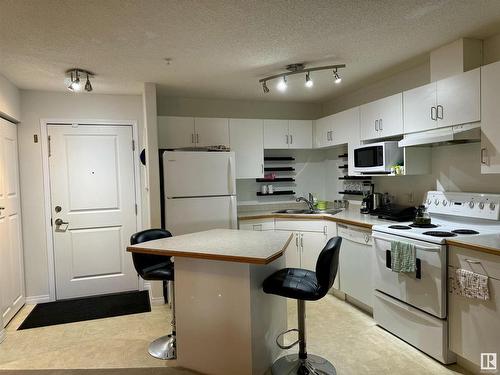 112 16221 95 Street, Edmonton, AB - Indoor Photo Showing Kitchen With Double Sink