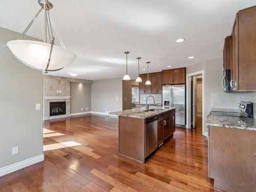 12231 170 Avenue, Edmonton, AB - Indoor Photo Showing Kitchen With Fireplace