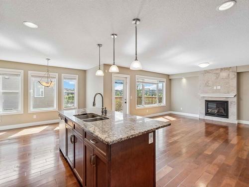 12231 170 Avenue, Edmonton, AB - Indoor Photo Showing Kitchen With Fireplace With Double Sink With Upgraded Kitchen