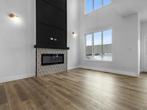 20759 24 Avenue, Edmonton, AB - Indoor Photo Showing Living Room With Fireplace