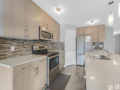 2320 68 Street Sw, Edmonton, AB - Indoor Photo Showing Kitchen With Double Sink With Upgraded Kitchen