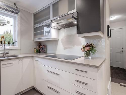 12 Kingsborough Court, St. Albert, AB - Indoor Photo Showing Kitchen With Double Sink