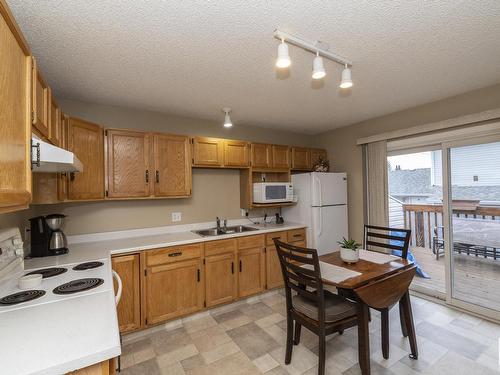 2 13217 155 Avenue, Edmonton, AB - Indoor Photo Showing Kitchen With Double Sink