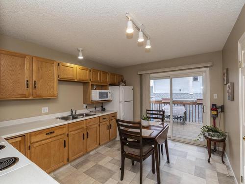 2 13217 155 Avenue, Edmonton, AB - Indoor Photo Showing Kitchen With Double Sink