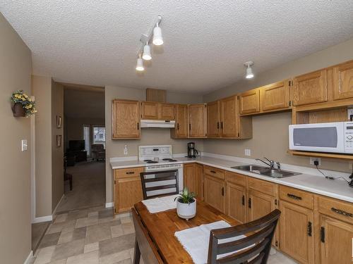 2 13217 155 Avenue, Edmonton, AB - Indoor Photo Showing Kitchen With Double Sink