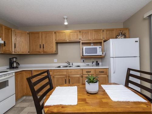 2 13217 155 Avenue, Edmonton, AB - Indoor Photo Showing Kitchen With Double Sink