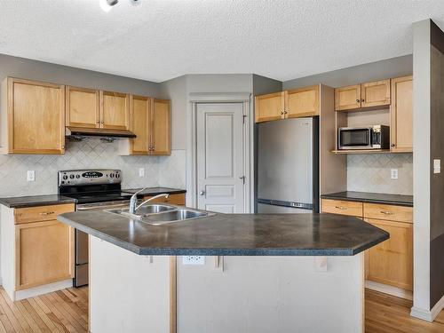 548 Leger Way, Edmonton, AB - Indoor Photo Showing Kitchen With Double Sink