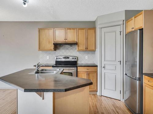 548 Leger Way, Edmonton, AB - Indoor Photo Showing Kitchen With Stainless Steel Kitchen With Double Sink