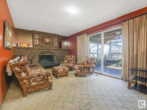 10206 173A Avenue, Edmonton, AB - Indoor Photo Showing Living Room With Fireplace