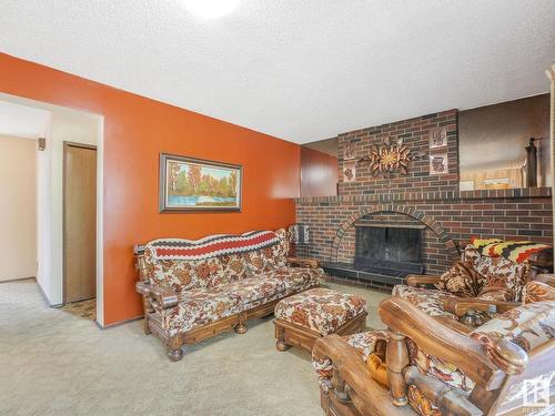 10206 173A Avenue, Edmonton, AB - Indoor Photo Showing Living Room With Fireplace