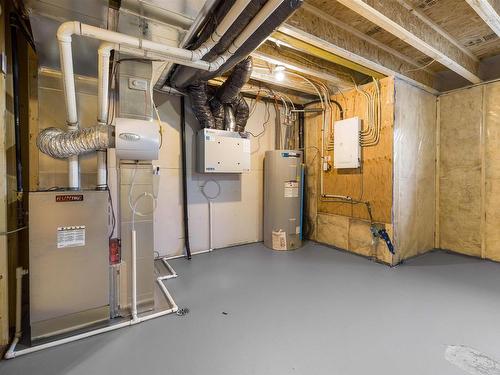 15 Kiwyck Link, Spruce Grove, AB - Indoor Photo Showing Basement