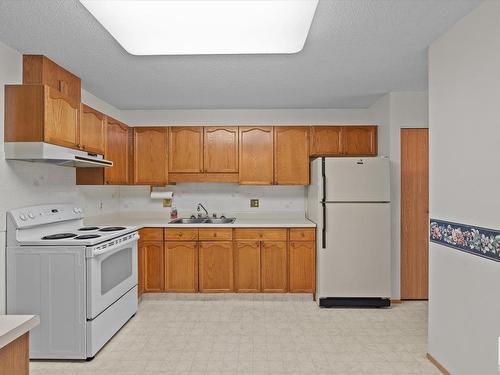 219 Knottwood Road Nw, Edmonton, AB - Indoor Photo Showing Kitchen With Double Sink