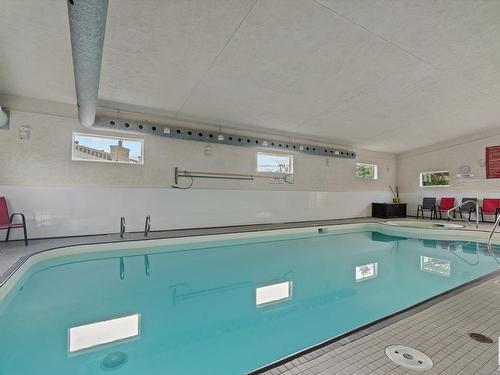 219 Knottwood Road Nw, Edmonton, AB - Indoor Photo Showing Other Room With In Ground Pool