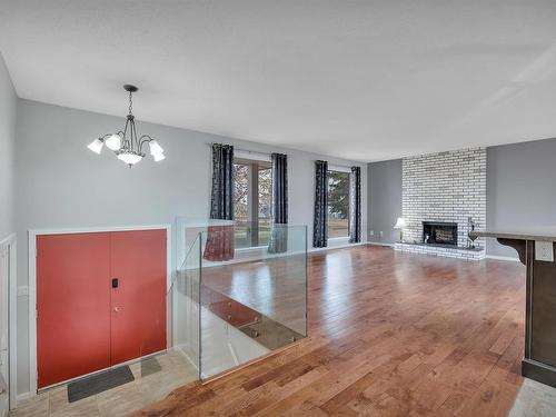 5714 52 St, Wetaskiwin, AB - Indoor Photo Showing Living Room With Fireplace