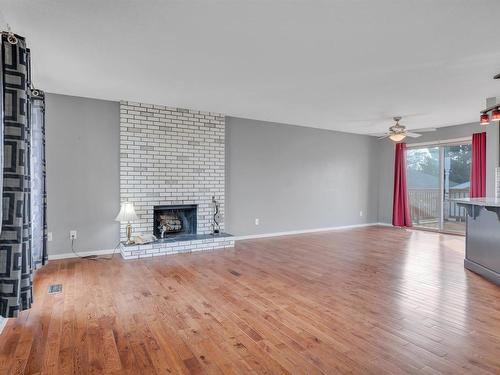 5714 52 St, Wetaskiwin, AB - Indoor Photo Showing Living Room With Fireplace