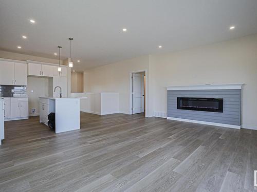 8 11 Dalton Link, Spruce Grove, AB - Indoor With Fireplace