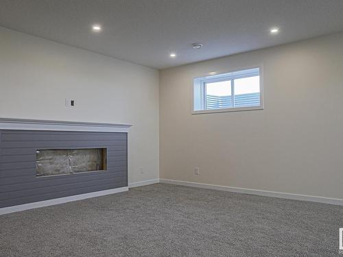 8 11 Dalton Link, Spruce Grove, AB - Indoor With Fireplace