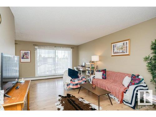 308 5125 Riverbend Road, Edmonton, AB - Indoor Photo Showing Living Room