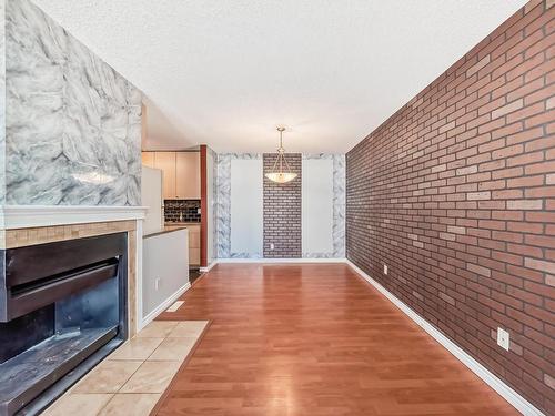 28 3111 142 Avenue, Edmonton, AB - Indoor With Fireplace