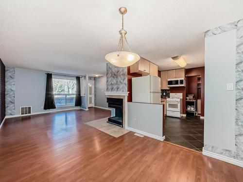 28 3111 142 Avenue, Edmonton, AB - Indoor With Fireplace