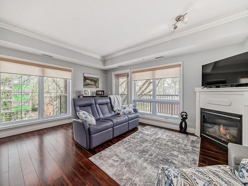 302 10232 115 Street, Edmonton, AB - Indoor Photo Showing Living Room With Fireplace