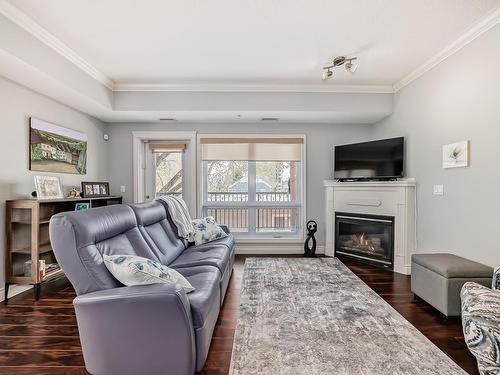 302 10232 115 Street, Edmonton, AB - Indoor Photo Showing Living Room With Fireplace