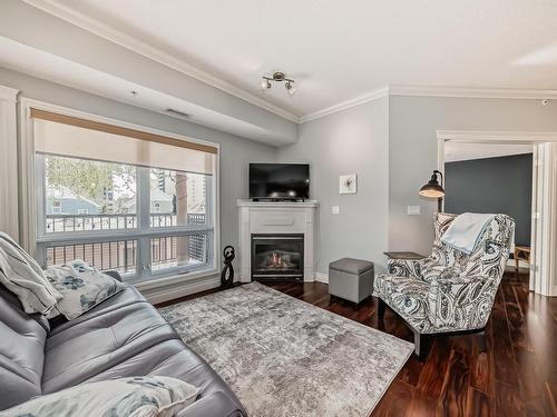 302 10232 115 Street, Edmonton, AB - Indoor Photo Showing Living Room With Fireplace