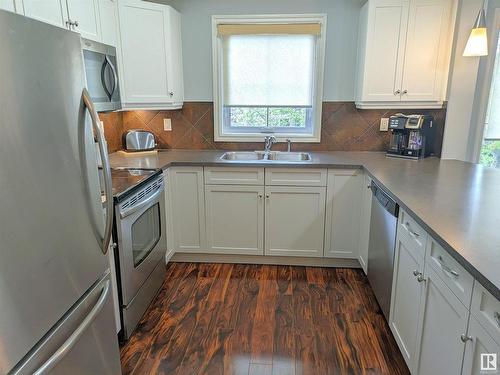 302 10232 115 Street, Edmonton, AB - Indoor Photo Showing Kitchen With Double Sink