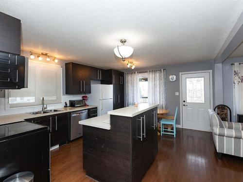 10603 103A Street, Westlock, AB - Indoor Photo Showing Kitchen With Double Sink