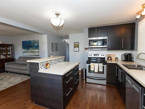 10603 103A Street, Westlock, AB - Indoor Photo Showing Kitchen With Double Sink