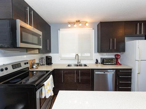 10603 103A Street, Westlock, AB - Indoor Photo Showing Kitchen With Double Sink