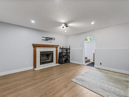 1508 48 Street, Edmonton, AB - Indoor Photo Showing Living Room With Fireplace